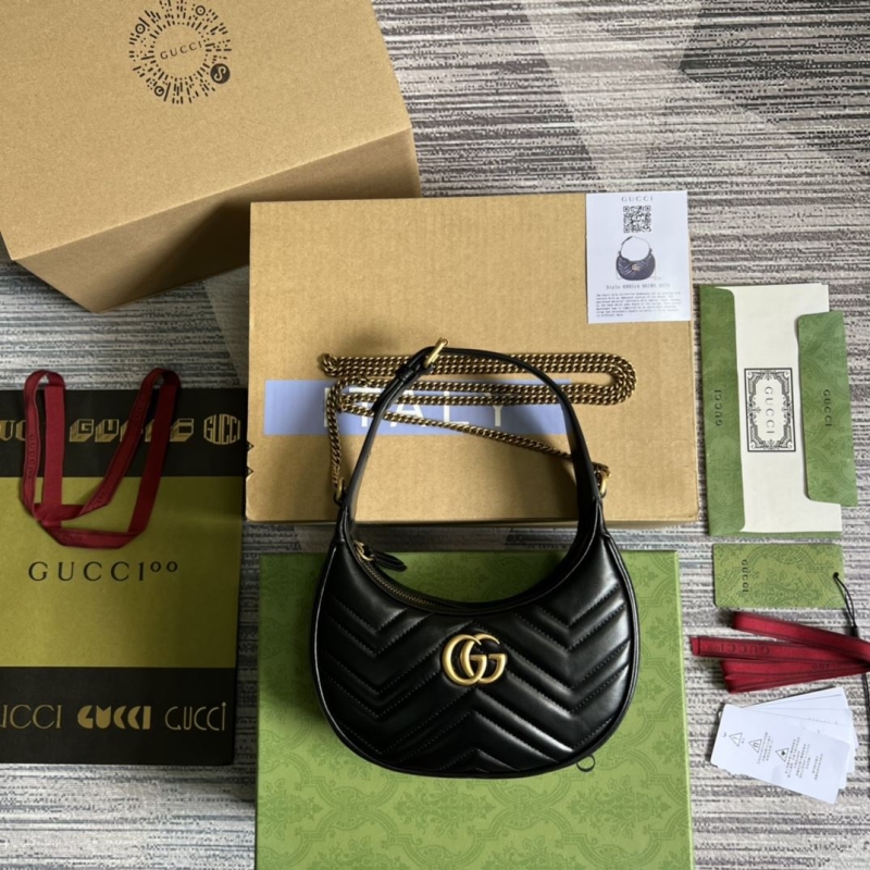 G*u*i top handle bags